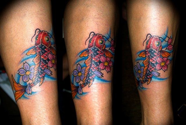 Conception de tatouage de poissons sur la jambe