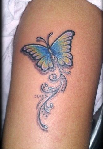 Papillon Design Tattoo sur le bras