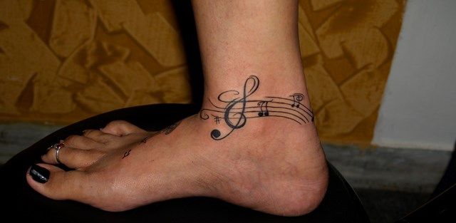 Musique Symbole tatouage sur Ankel